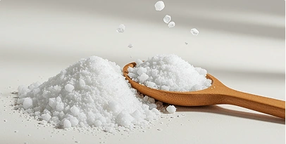 White L-carnitine powder on a dark surface